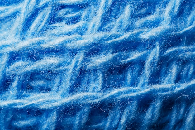 Wolgarenclose-up met blauwe draden voor handwerk