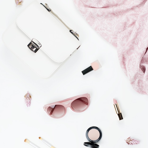 Woman accessories on white background