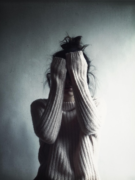 woman against wall