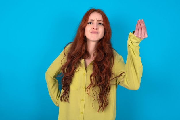 woman angry gesturing typical italian gesture with hand looking to camera