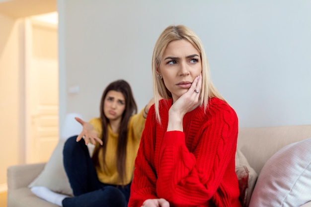 Woman apologizes to her friend after fight Repentant woman hope for forgiveness from sad pensive friend Family on verge of divorce Couple treason problem concept