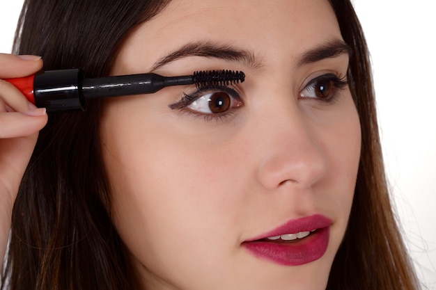 Woman applying eyeshadow