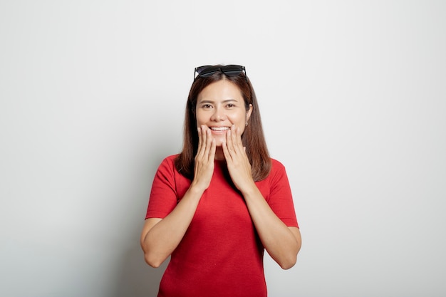 Woman asian hand touching face