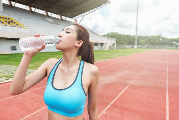 Woman athlete takes a break