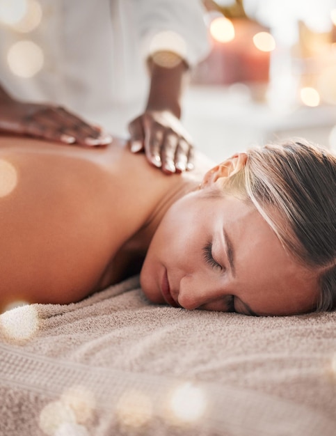 Woman back massage at spa and holistic therapy with masseuse hands wellness and treatment with zen Health peace of mind and stress relief self care and lifestyle with healing face and calm