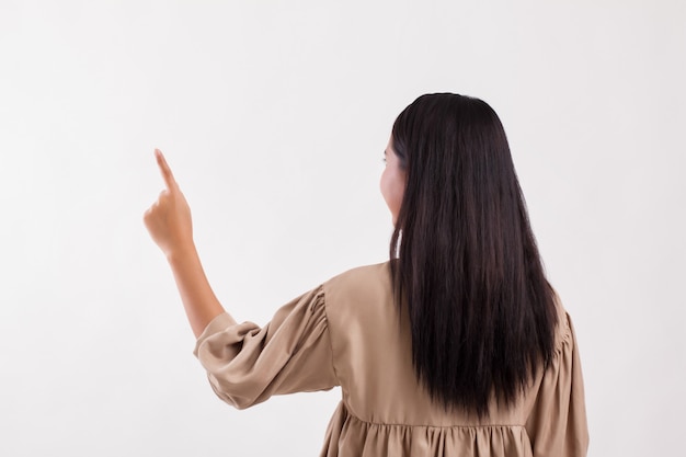 Woman back side pointing up, background