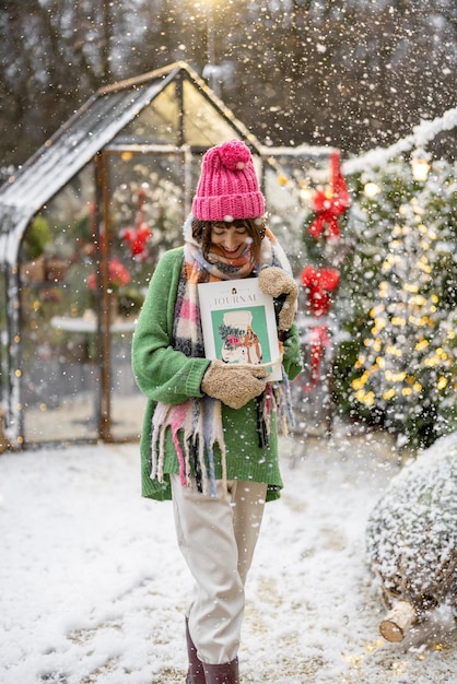 Woman at backyard on winter holidays