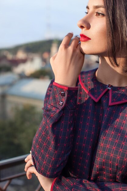 Woman in beautiful classic stylish clothes in the interior