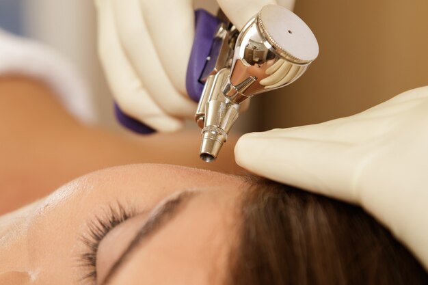 Woman in the beauty salon during  Bio oxidation therapy