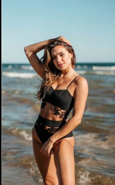 A woman in a black lingerie on the beach