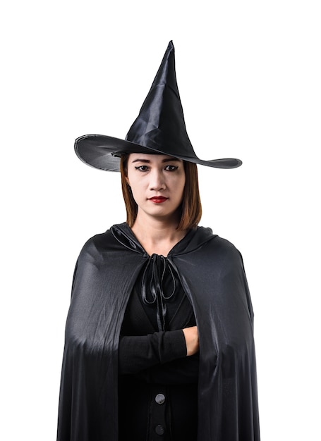 woman in black Scary witch halloween costume standing with hat isolated white 