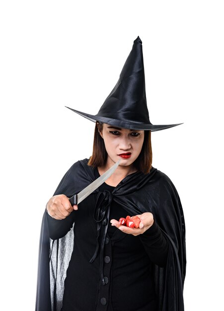 Foto donna in nero scary strega halloween costume in piedi con cappello isolato bianco