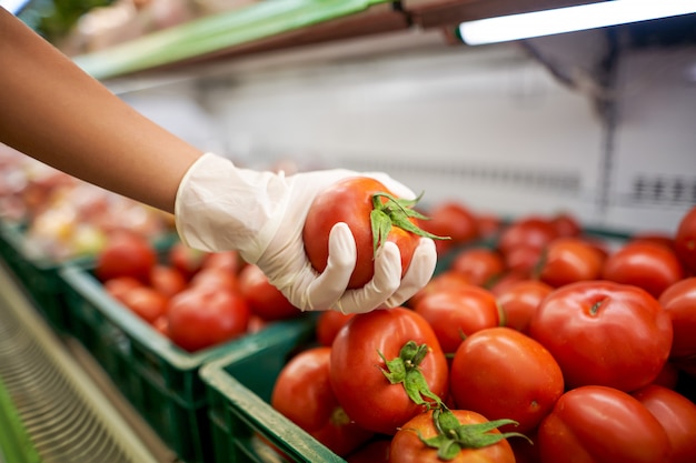 Woman buying vegetables