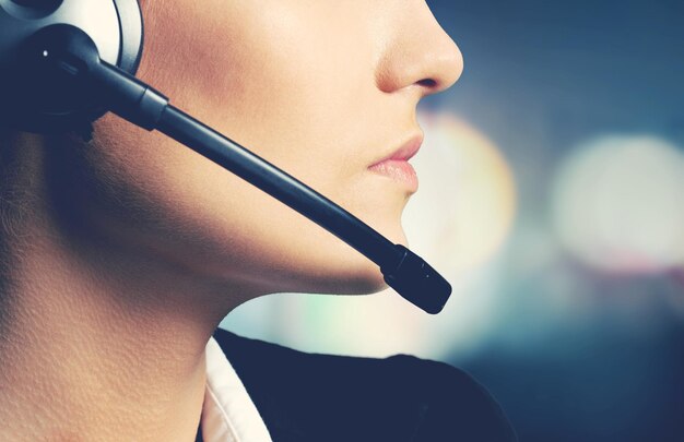 Woman Call Center operator on dark background