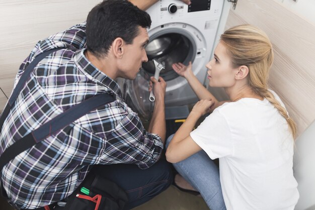 The woman called the repairman of the washing machine.