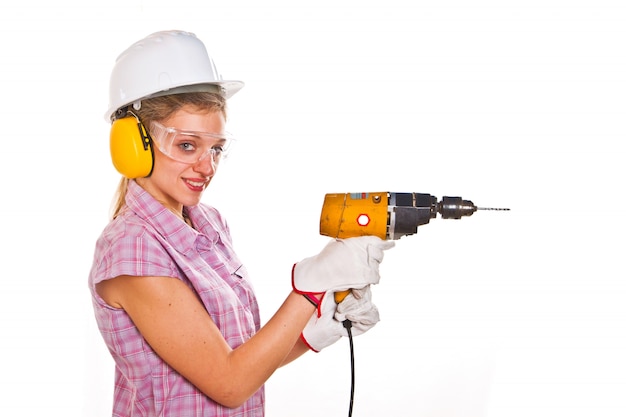 woman carpenter holding drill 