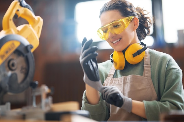 Woman carpenter in workshop