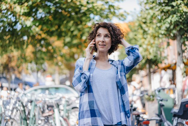 Woman on cell phone in the city