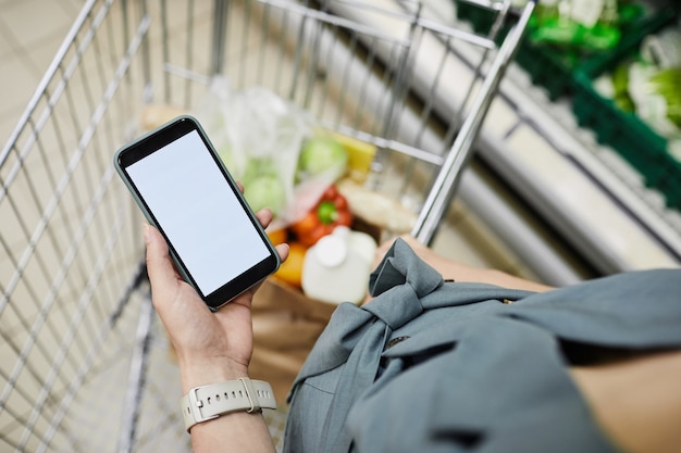 Woman Checking Notes In Store