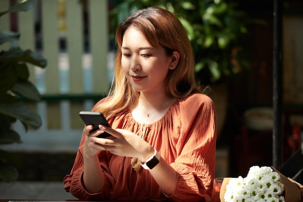 Woman Checking Smartphone