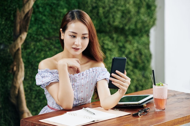 WOman checking social media