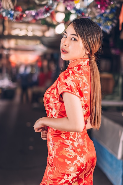 Woman in a cheongsam dress