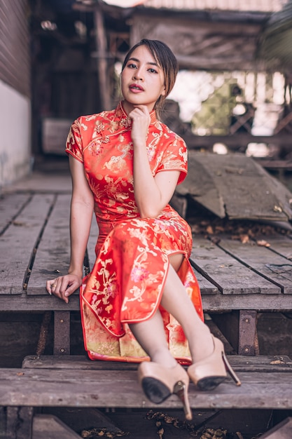 Woman in a cheongsam dress