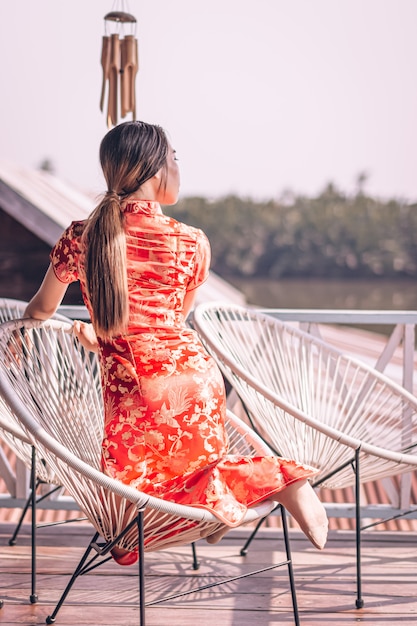 Woman in a cheongsam dress