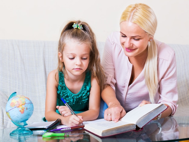 Woman and child having lesson 