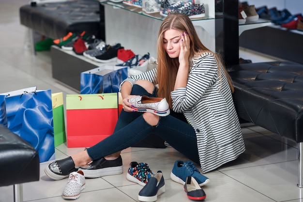 Woman choosing shoes