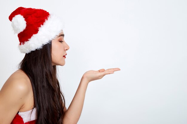 Woman in christmas dress on white