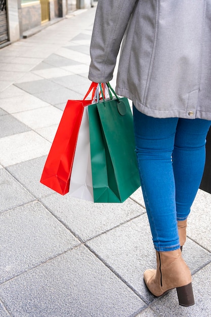 Woman in city shopping