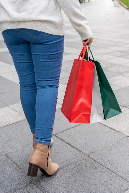 Woman in city shopping