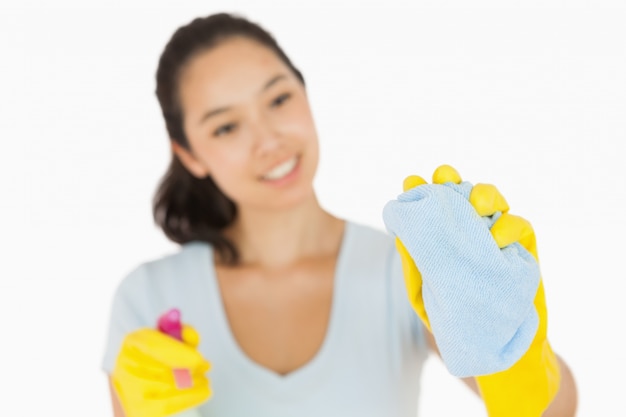 Woman cleaning a window