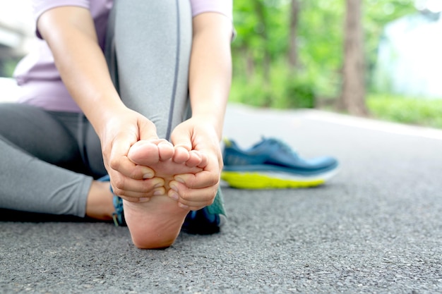 the woman clings to a bad leg the pain in her leg health and painful concept