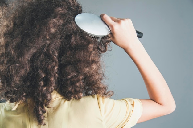 Woman comb hair