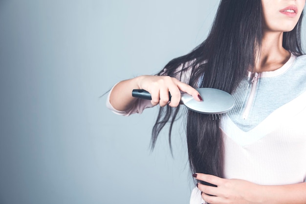 Woman comb the hair