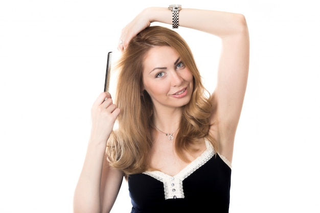 Woman combing her hair