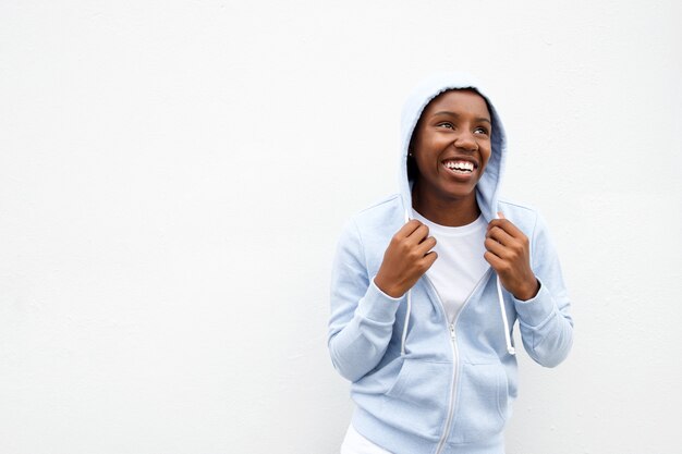 Woman in comfortable hoodie looking up