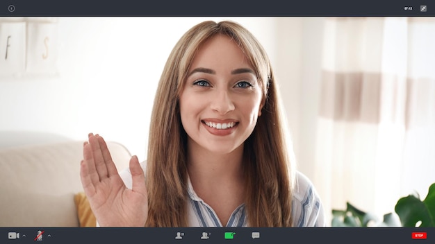 Photo woman communicating with coworkers from home using video chat view through camera