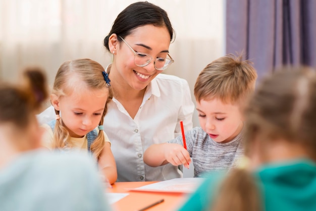 Woman communicating with her students in class