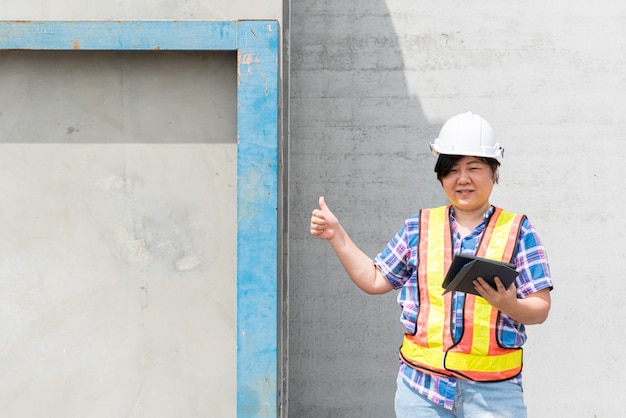 Woman construction engineer at construction site