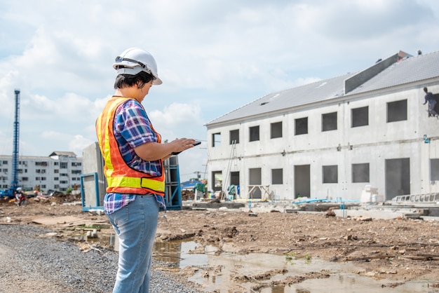 Woman construction engineer at construction site