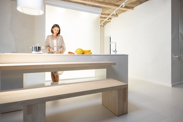 Woman cooking healthy at modern kitchen