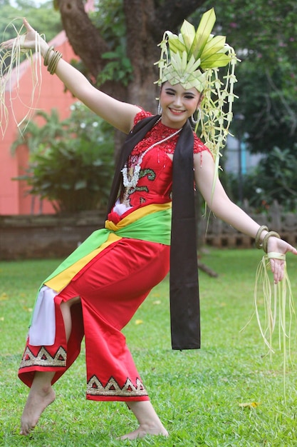 a woman in a costume with a dragon on her head