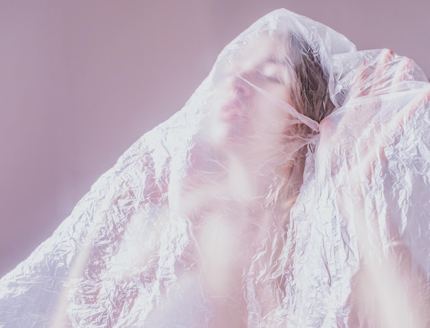 woman covered in plastic