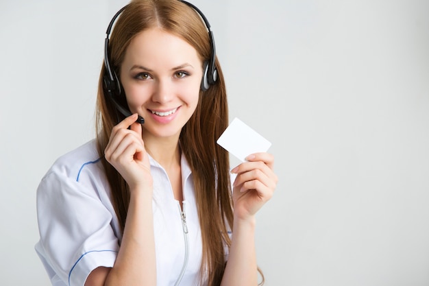 Woman customer service worker, call center smiling operator with phone headset