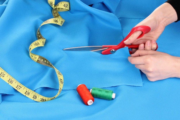 Woman cutting fabric