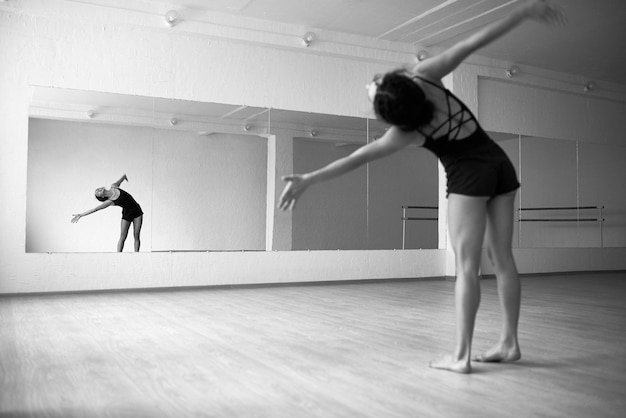 Woman in Dance Studio Mirror