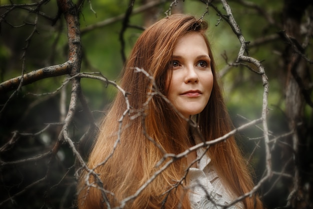 Woman in Dark Forest, Looking Away